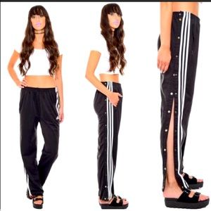 Adidas warm up snap up pants with 3 stripe logo. Comfy and perfect condition.